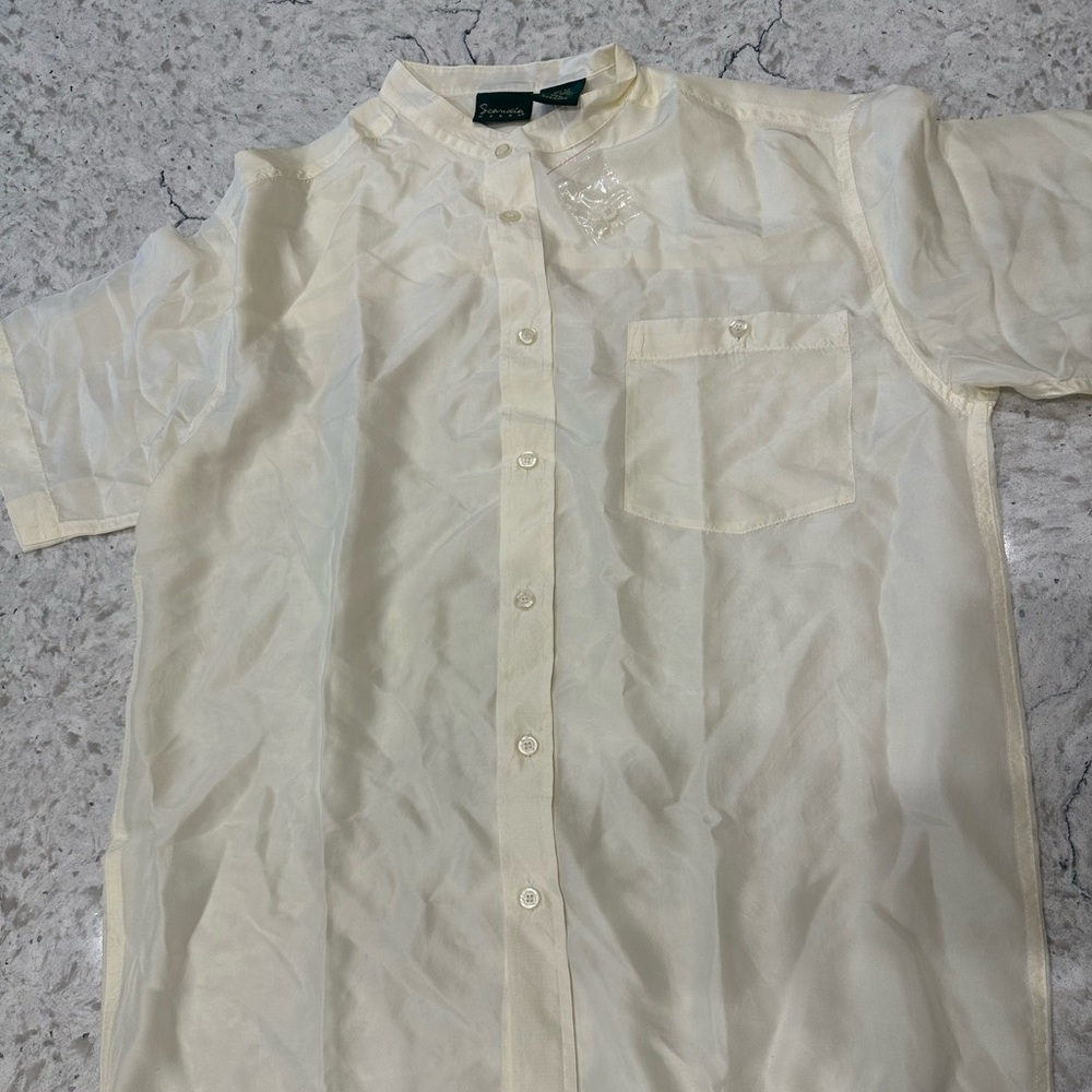 Men’s hundred percent silk shirt. Brand new.